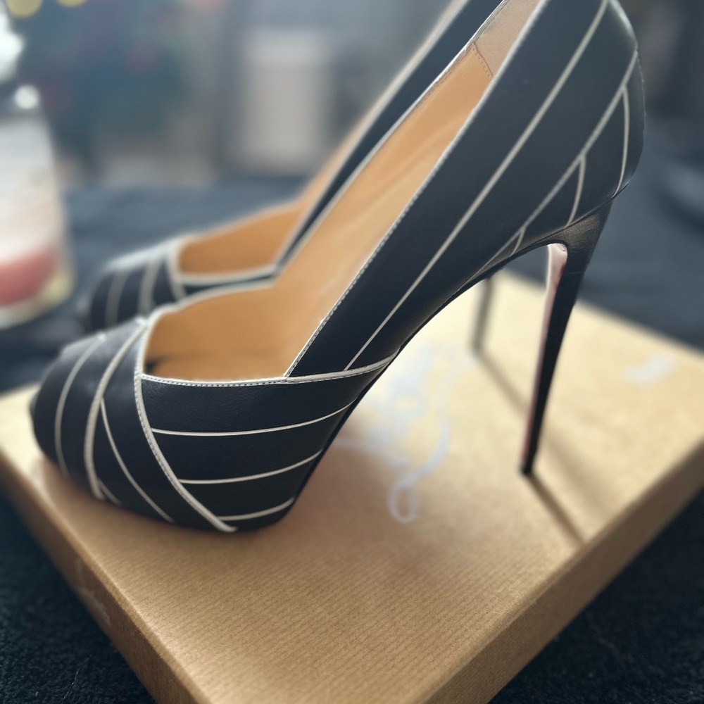 Like new Christian Louboutin  7.5 or 38.